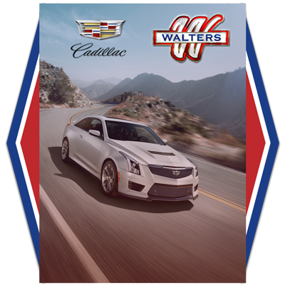 Cadillac sedan on mountain road Walters dealership